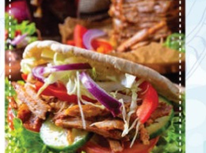 Kebab in pitta bread with fresh salad